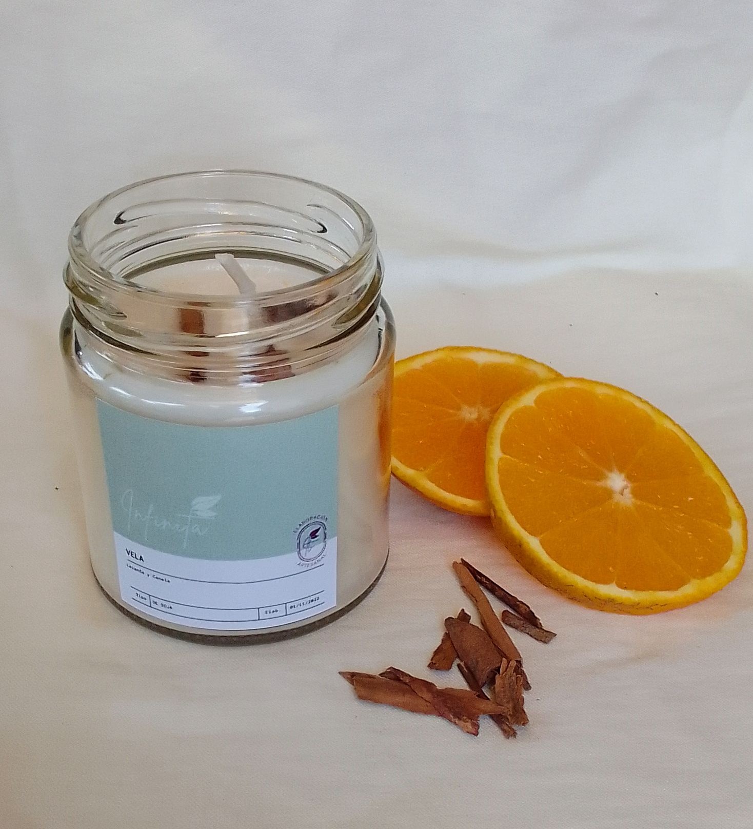 Frasco de vela aroma naranja-canela 